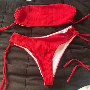 Red tube top bathing suit.